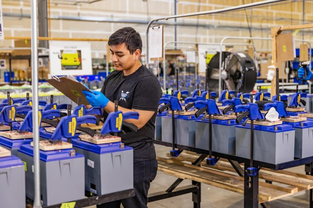Battle Born Batteries Production Team Member Assembling Batteries